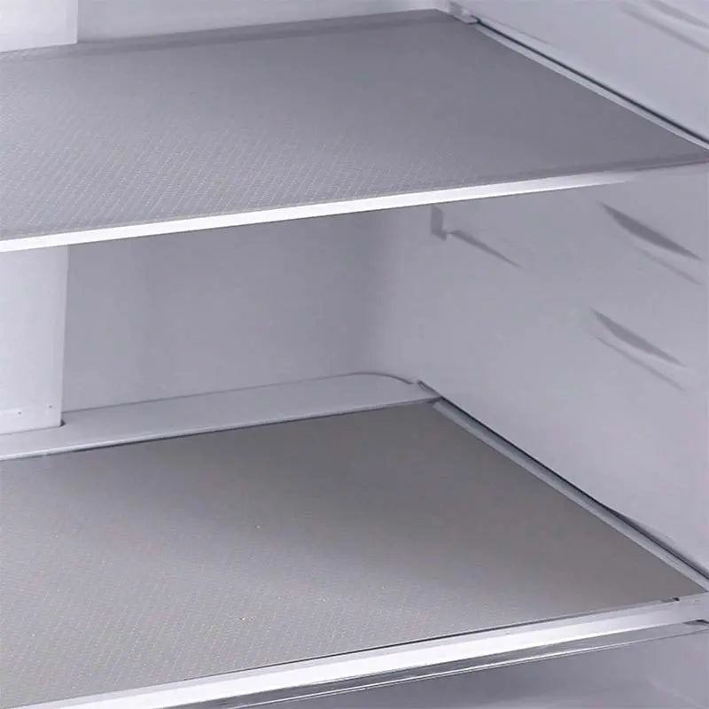 8 piezas por 26 euros-🧊🛡️ Protectores impermeables para estantes de refrigerador — Antideslizantes, fáciles de limpiar y aptos para contacto con alimentos — Mantén los estantes ordenados y frescos ✨
