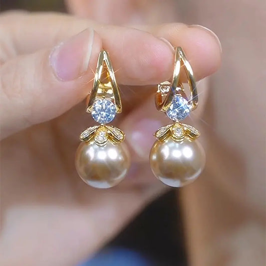 💋【Compre uno y llévese otro gratis】 Pendientes de plata con perlas de lujo francés de nuevo estilo 2026
