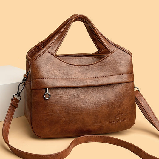 👜Bolso de hombro retro de gran capacidad para mujer, sencillo y versátil, de color sólido, bolso de viaje informal de piel suave de alta calidad.
