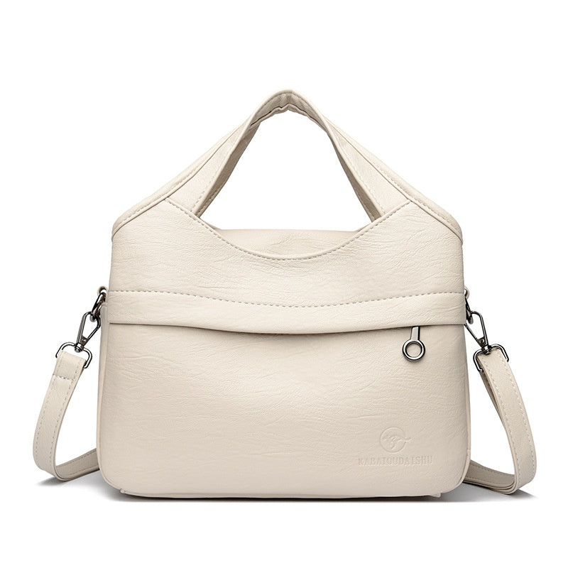 👜Bolso de hombro retro de gran capacidad para mujer, sencillo y versátil, de color sólido, bolso de viaje informal de piel suave de alta calidad.
