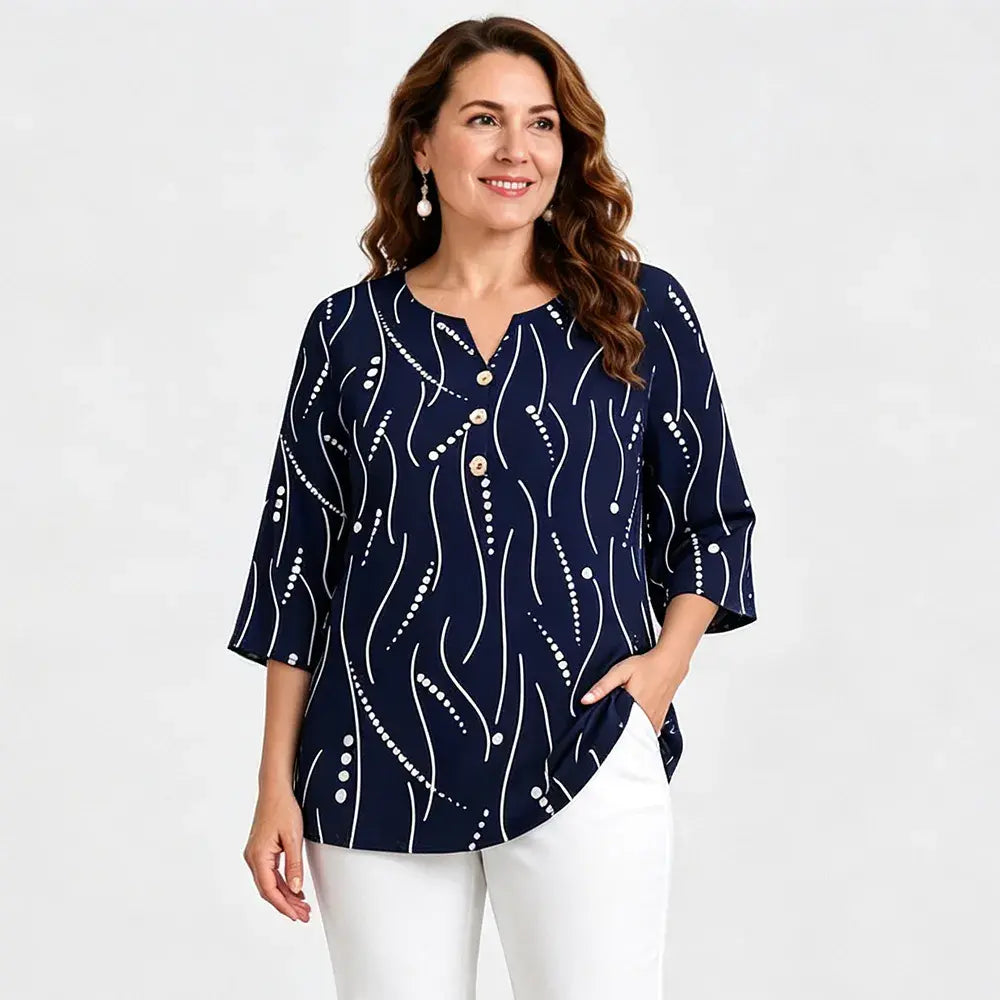 Blusa estampada de cuello en V y talla grande: corte holgado, manga corta y diseño floral; una blusa ligera para mujer con efecto reductor en la cintura.